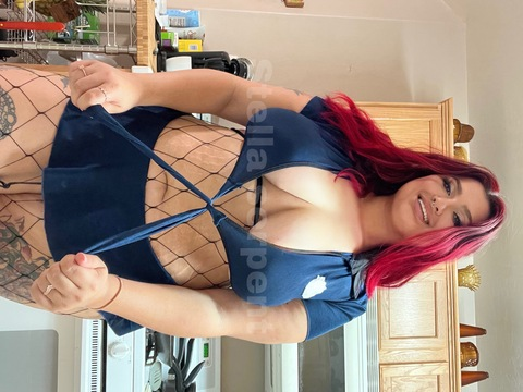 Header of inkedandnaughtyredhead